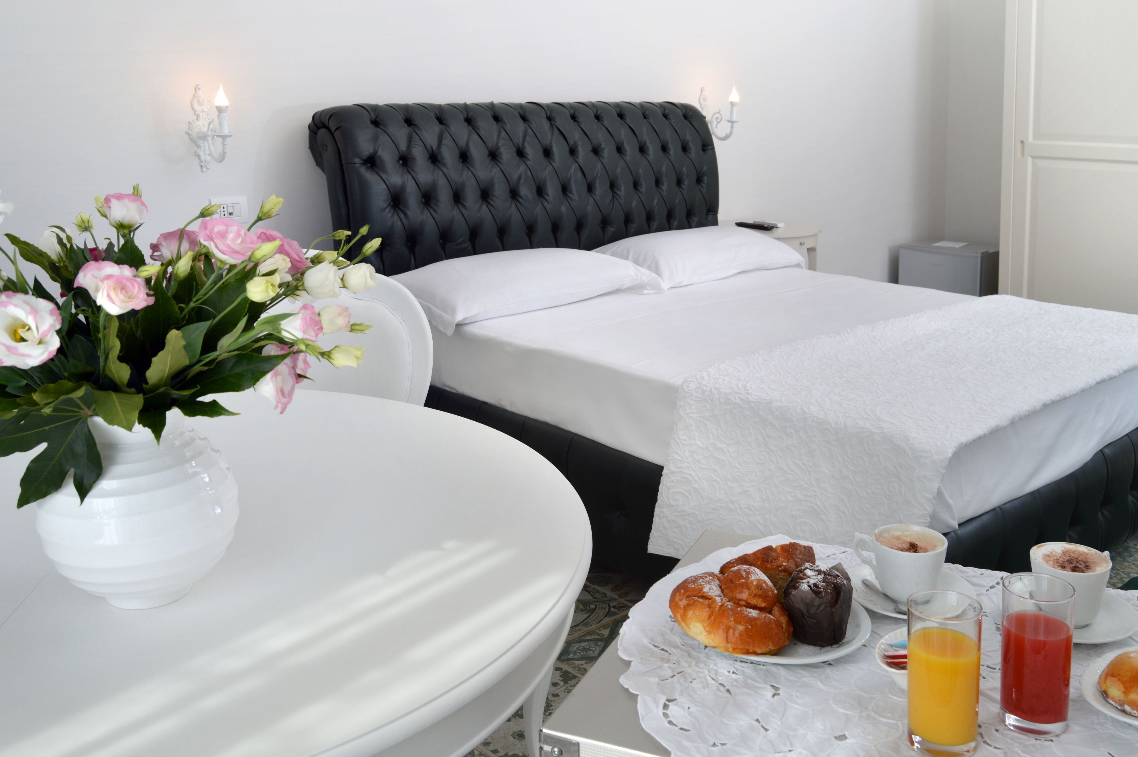 Frette Italian sheets, premium bedding, down duvets, pillow-top beds