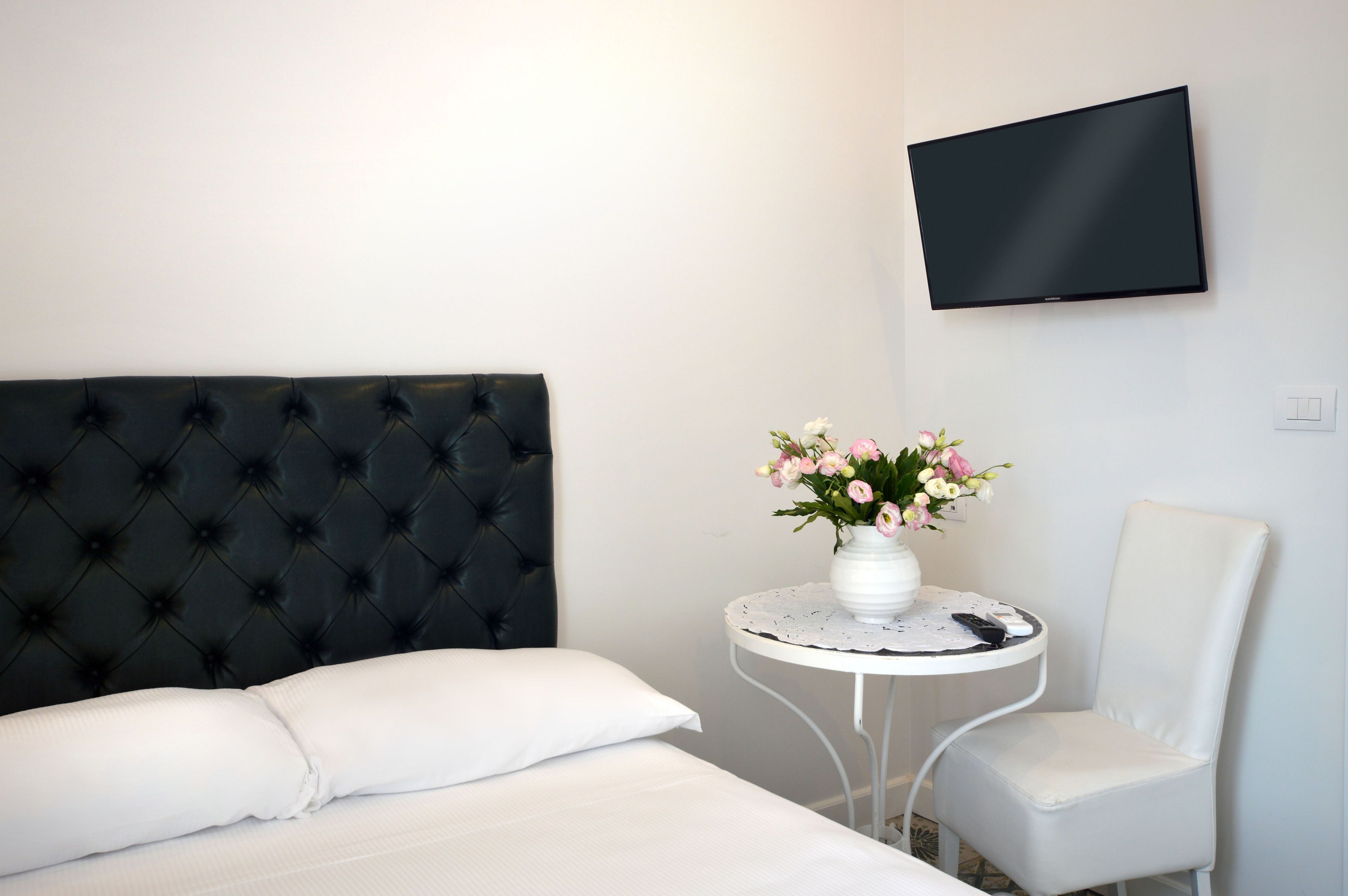 Frette Italian sheets, premium bedding, down duvets, pillow-top beds