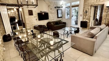 Smart TV, DVD player, table football, books