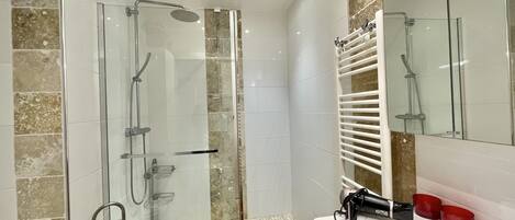 Shower, hair dryer, towels