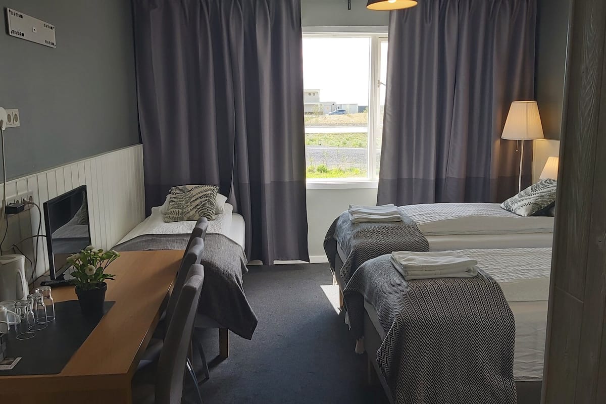 superior triple room, private bathroom | 1 bedroom, desk, blackout curtains, soundproofing