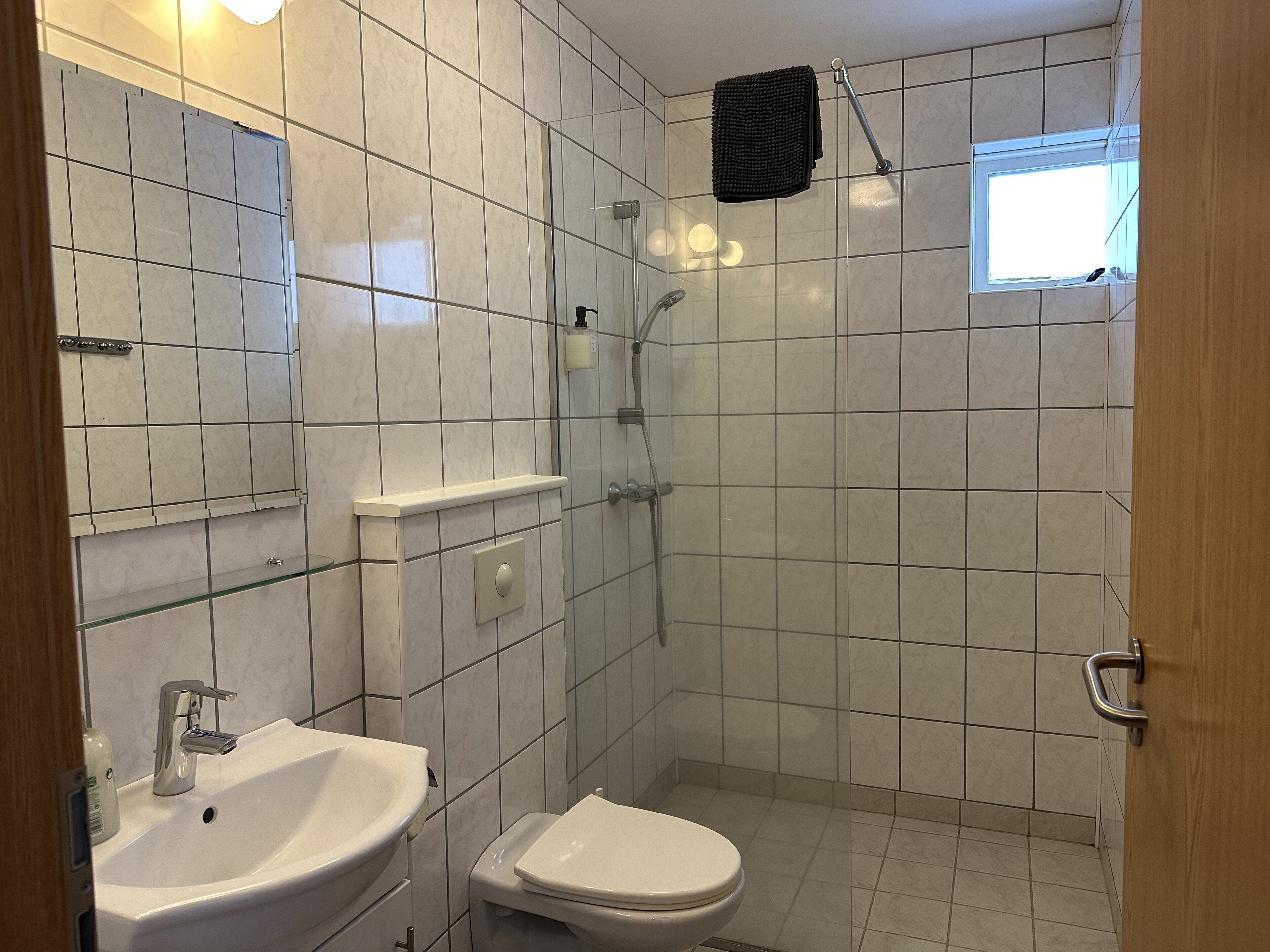 double room, private bathroom (small) | bathroom | shower, free toiletries, hair dryer, towels