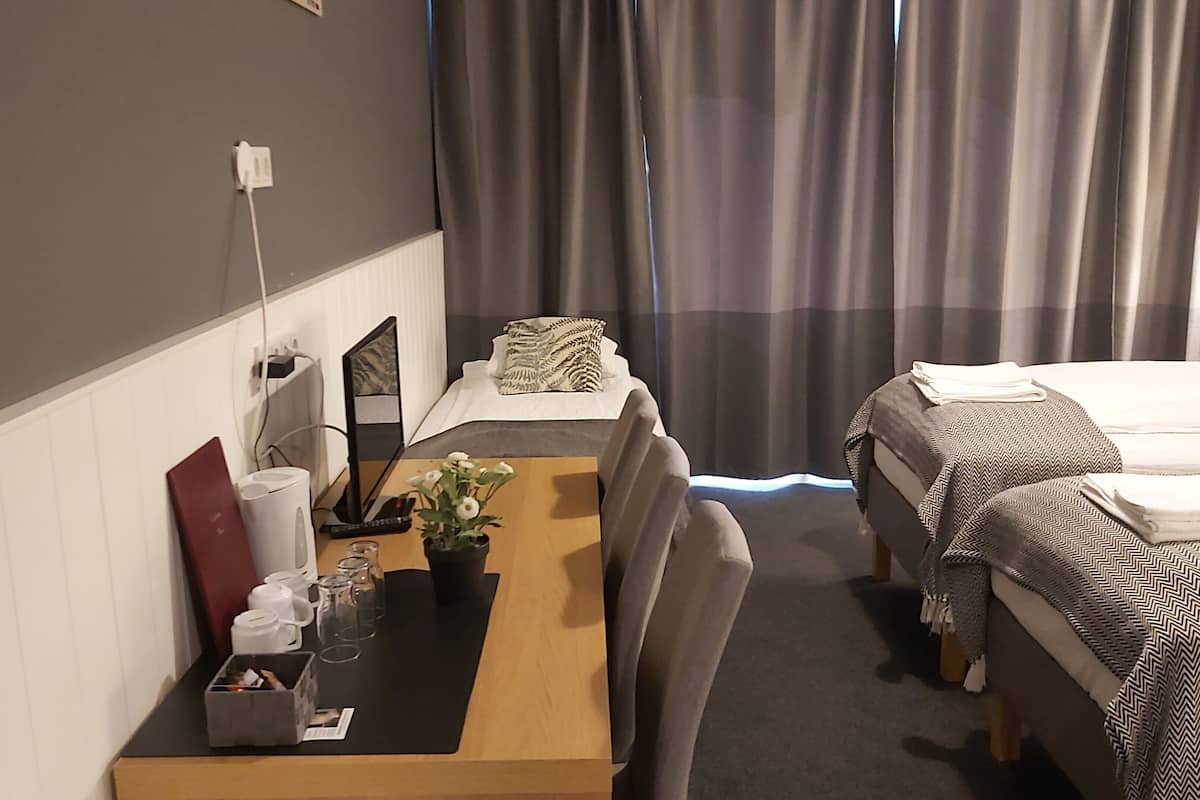 superior triple room, private bathroom | 1 bedroom, desk, blackout curtains, soundproofing