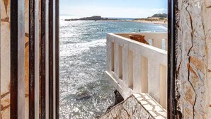 A stone staircase leading to a balcony overlooking the sea. - Villa Rena by the sea! (Arkoudi)