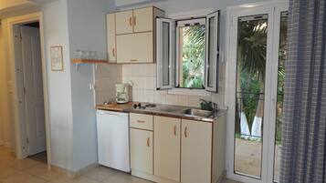 Departamento, vista al mar (20) | Cocina privada | Refrigerador, parrilla de estufa, lavavajillas y cafetera y tetera