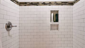 Bathtub, hair dryer, towels, soap