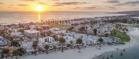 On the beach, sun loungers, beach towels