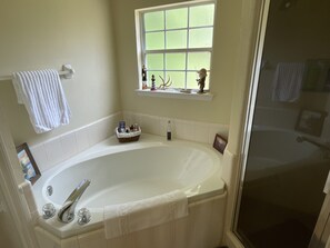 Combined shower/bathtub, hair dryer, towels, soap