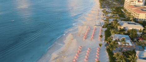 On the beach, sun loungers, beach towels