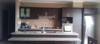 Prime location, modern, spacious condo In Cuenca Sleeps 6