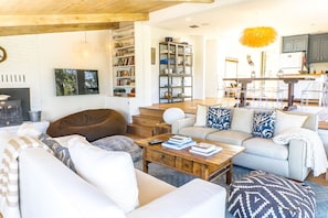 Smart TV, fireplace, DVD player, books