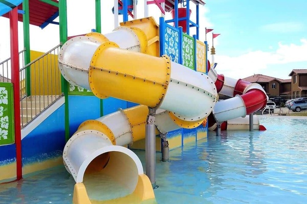 Across the street from private water park with multiple slides