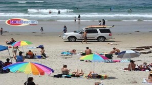 On the beach, sun loungers