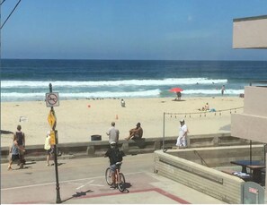 On the beach, sun-loungers