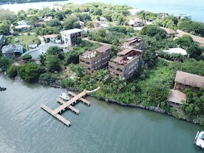 Exterior - Luxury Waterfront Condo w/ Pool, Dock, and Gardens (West End)