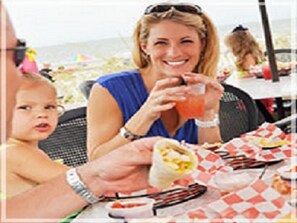 Outdoor dining - Large Balcony overlooking rookery and golf course, King bed,bikesCoastal Decor (Hilton Head Island)
