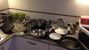 A kitchen with various cookware and utensils. - Grand Canal Apartment...Venetian Dream!!! All Inclusive Options! No Extras -WiFi (Venice)