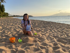 On the beach, sun loungers, beach towels