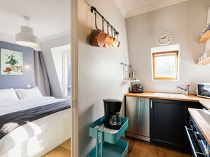 1 chambre, fer et planche à repasser, Wi-Fi gratuit, draps fournis