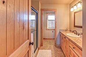 Combined shower/tub, hair dryer, towels, soap
