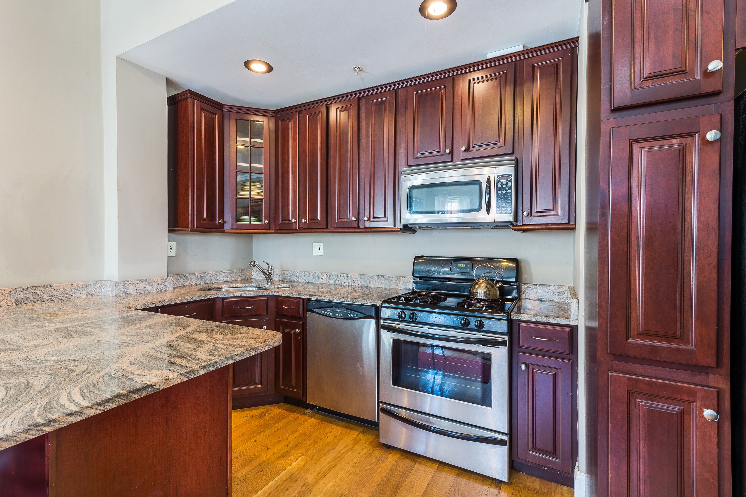 Coffee/tea maker, fridge, microwave, oven