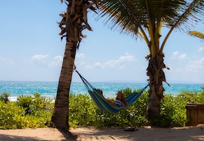 On the beach, sun loungers, beach towels