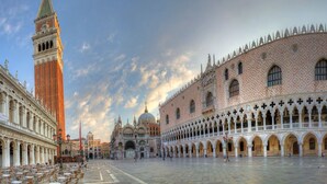 A spacious square with historical buildings, including a prominent tower and ornate facades. - SPLENDID STAR SAN MARCO SQUARE - Magic Dream ! All Inclusive Options-WIFi (Venice)