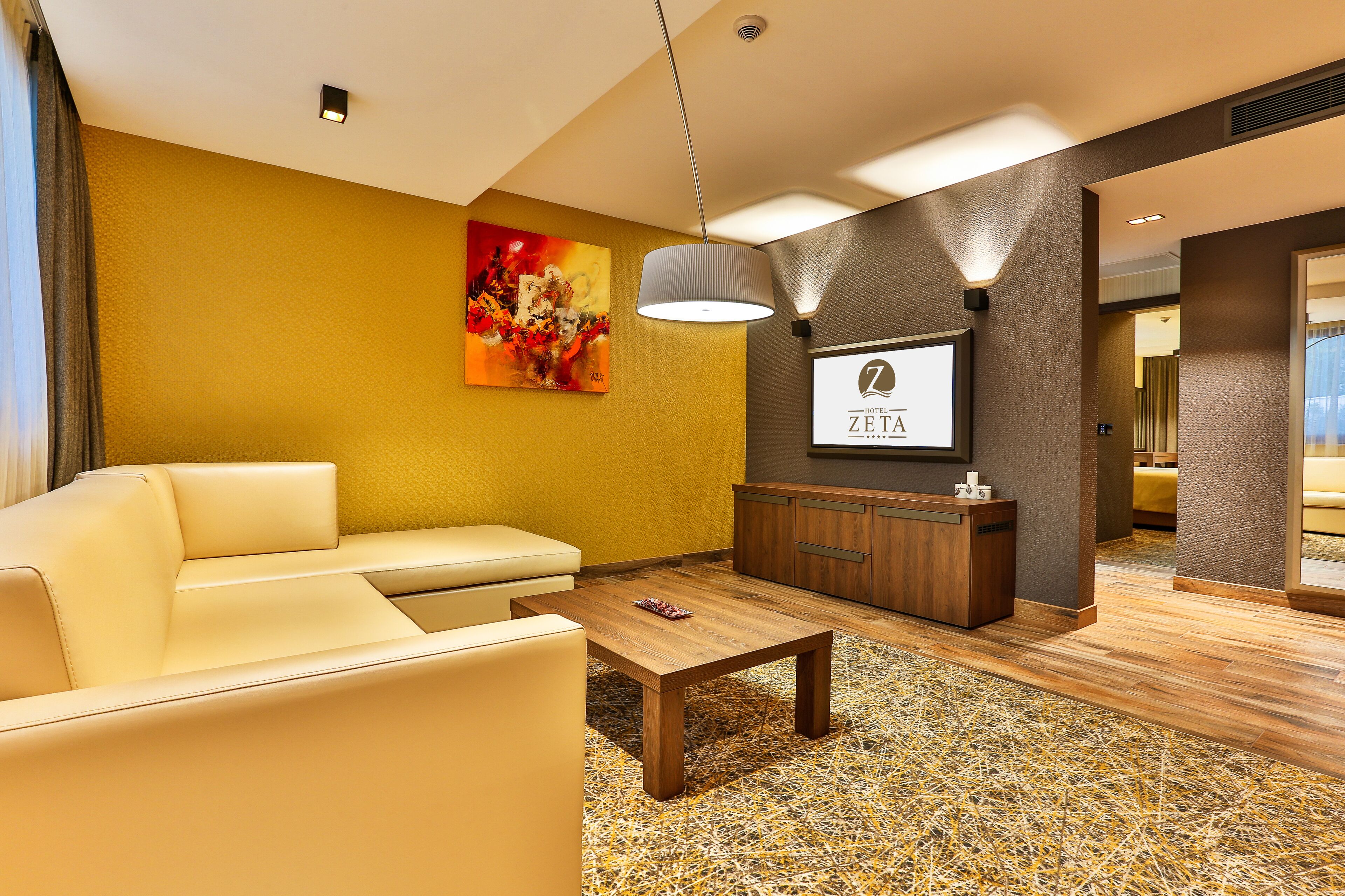 deluxe suite, 1 king bed, sea view | living area | flat-screen tv