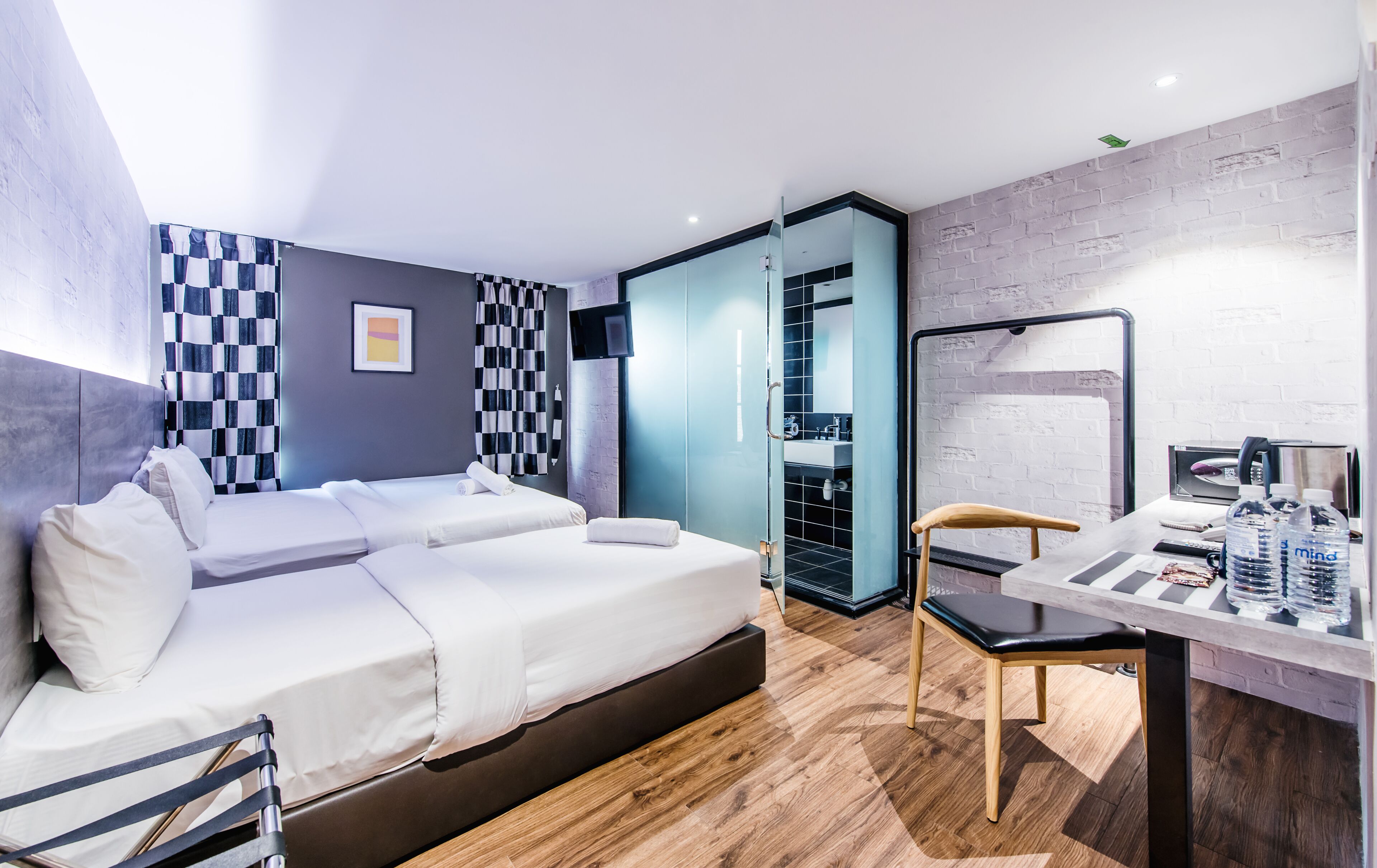 economy suite | in-room safe, desk, laptop workspace, blackout curtains