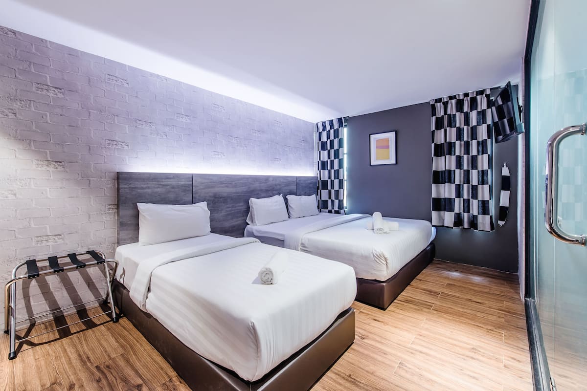 economy suite | in-room safe, desk, laptop workspace, blackout curtains