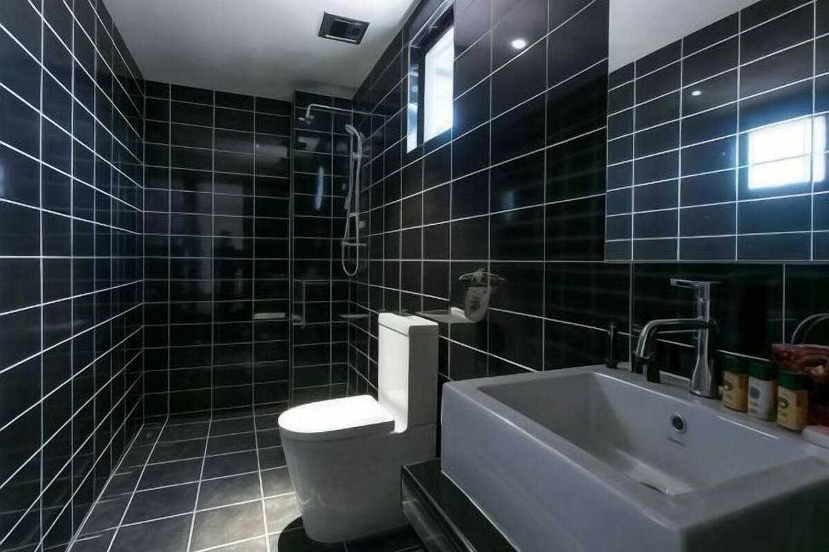 Bathroom | Shower, free toiletries, hair dryer (on request), slippers