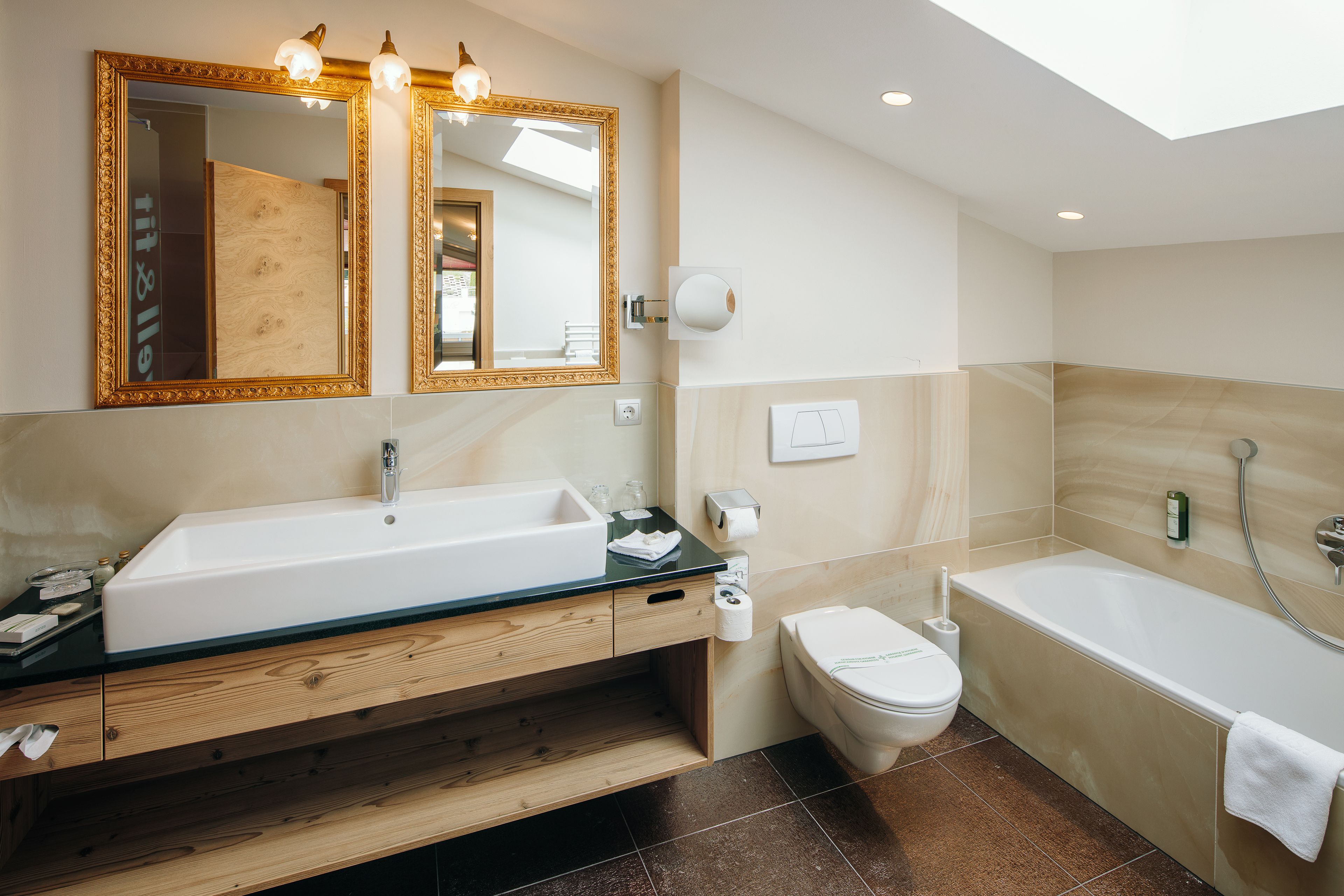 deep-soaking bathtub, free toiletries, hair dryer