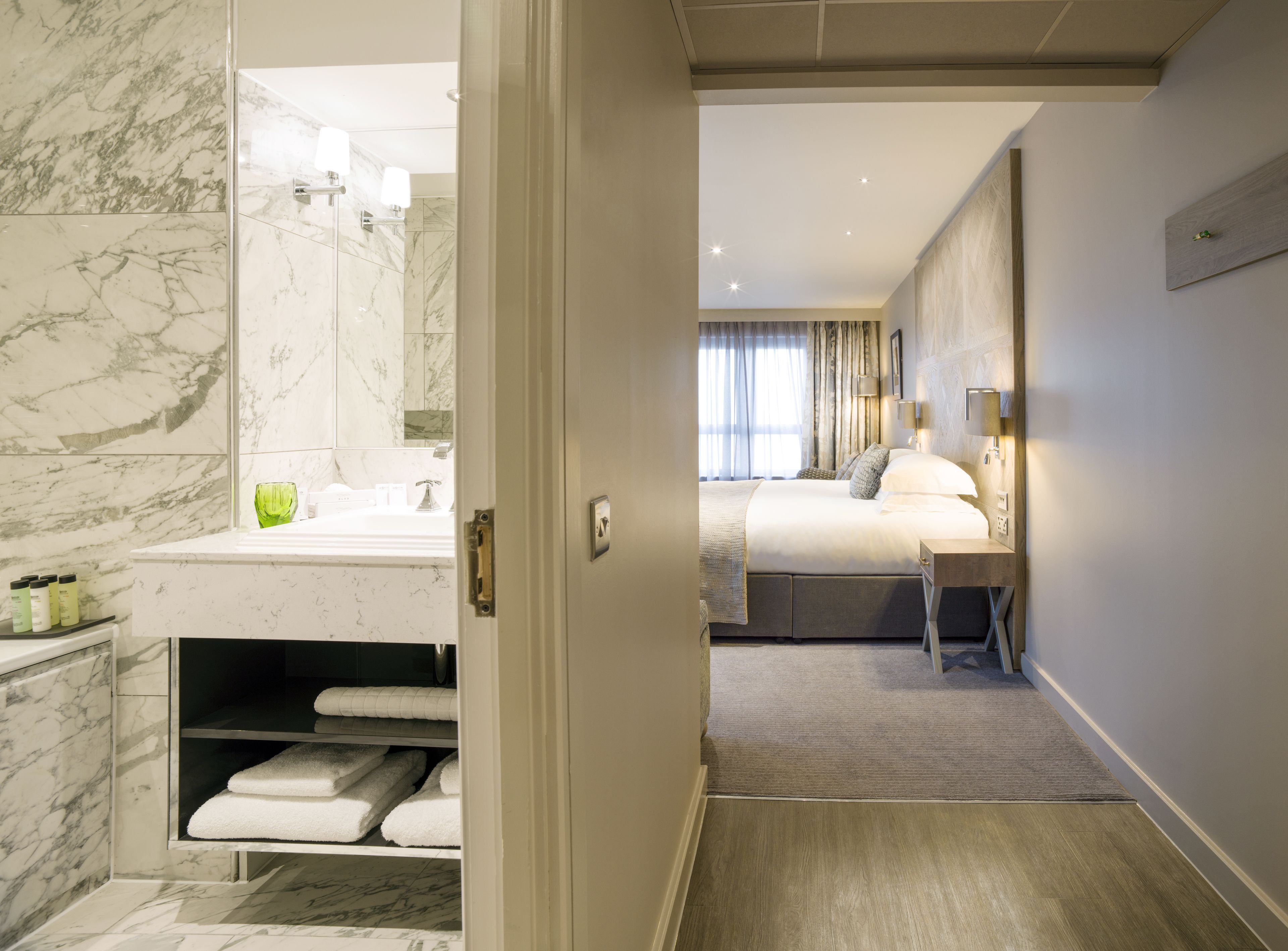 junior suite, 1 king bed, sea view | in-room safe, desk, laptop workspace, blackout curtains