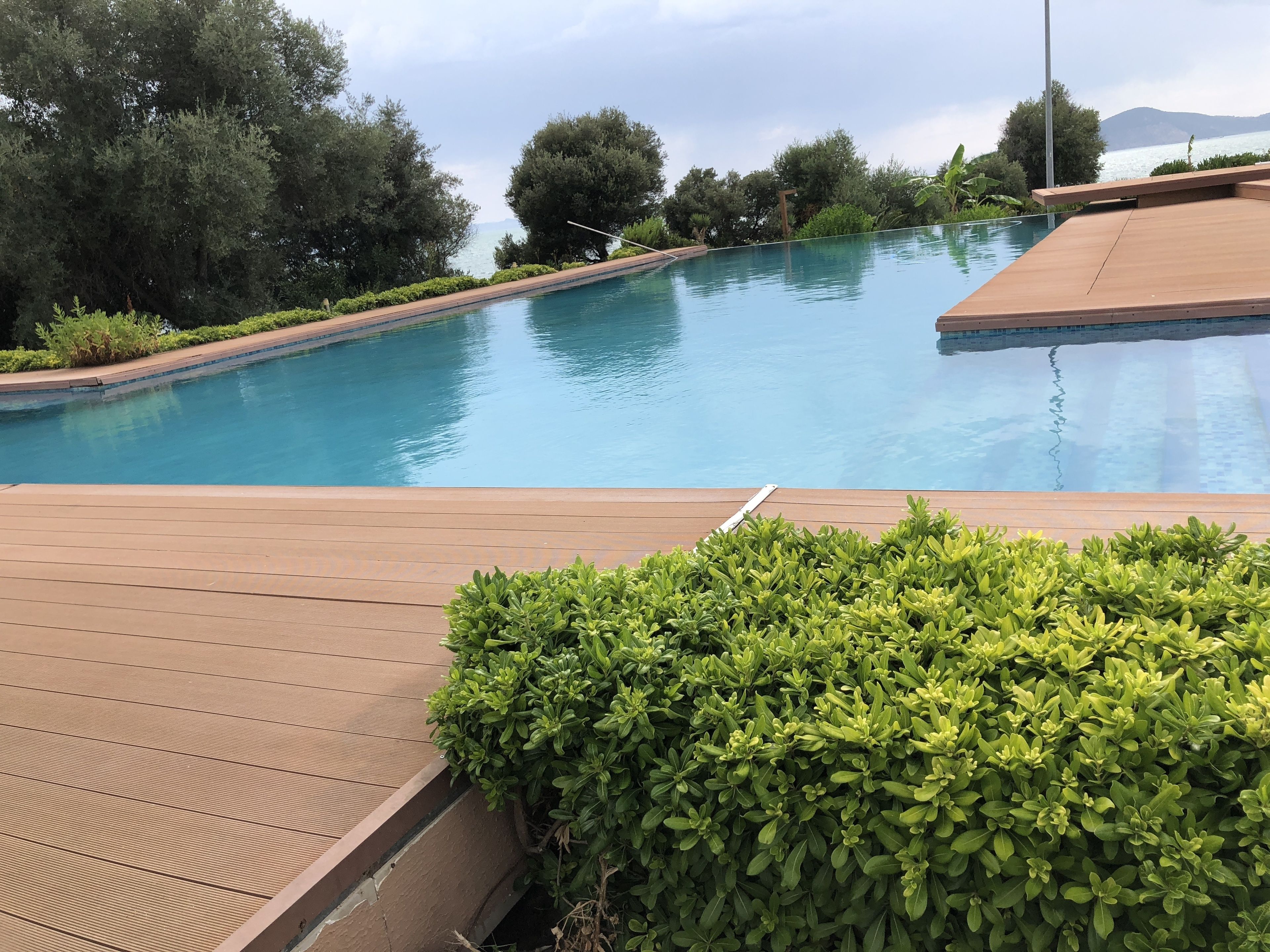 seasonal outdoor pool, open 9 am to 7:30 pm, pool umbrellas