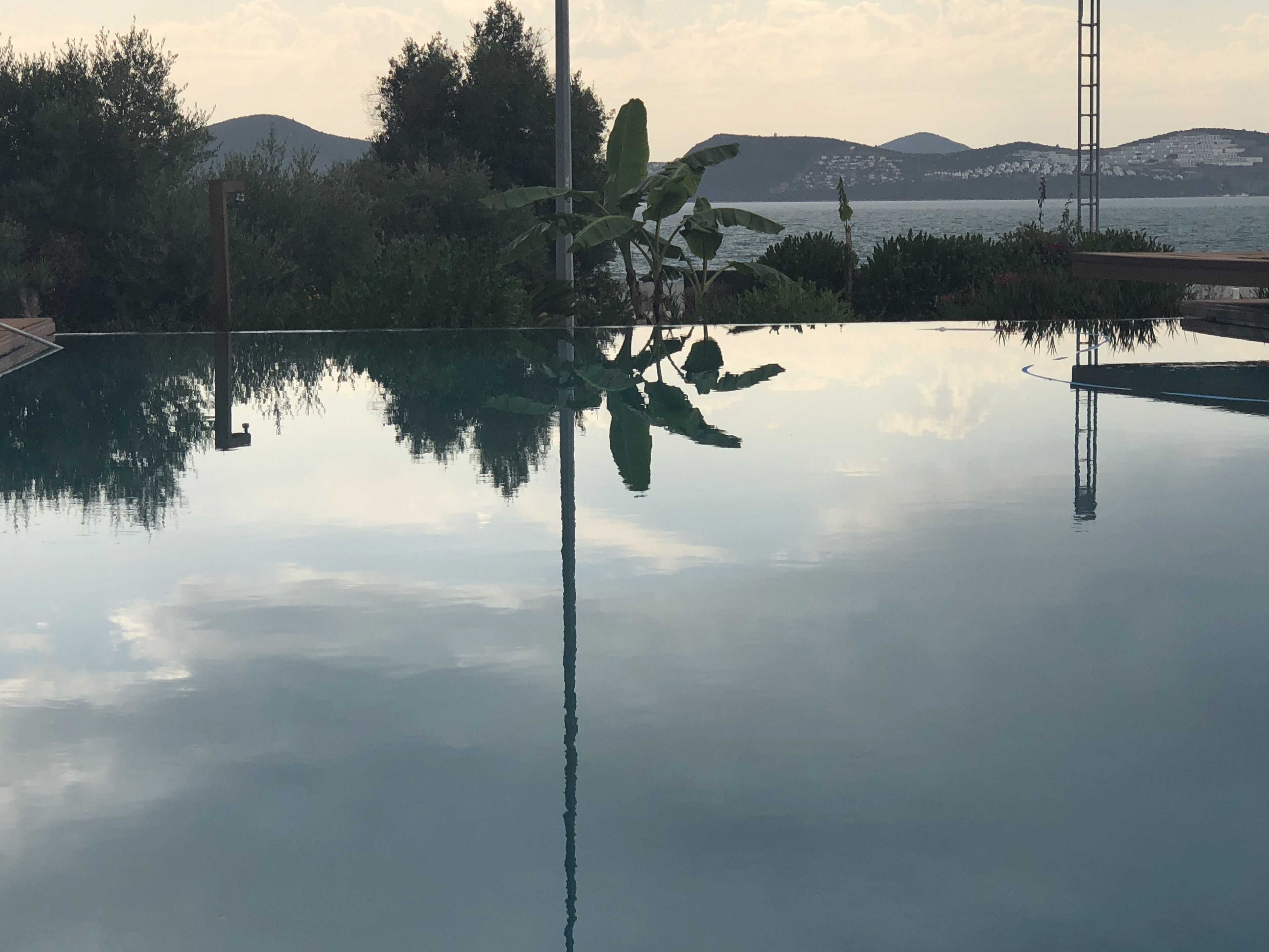 seasonal outdoor pool, open 9 am to 7:30 pm, pool umbrellas