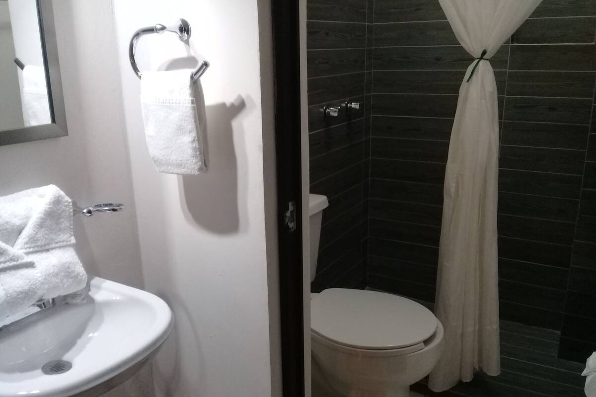 Basic Double Room Single Use, 1 Queen Bed, Non Smoking | Bathroom | Shower, towels