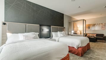 Suite, Multiple Beds | In-room safe, desk, soundproofing, iron/ironing board