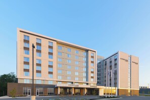 A Courtyard by Marriott hotel with a modern design, featuring a central courtyard and multiple floors. - Courtyard by Marriott Halifax Dartmouth (Dartmouth)