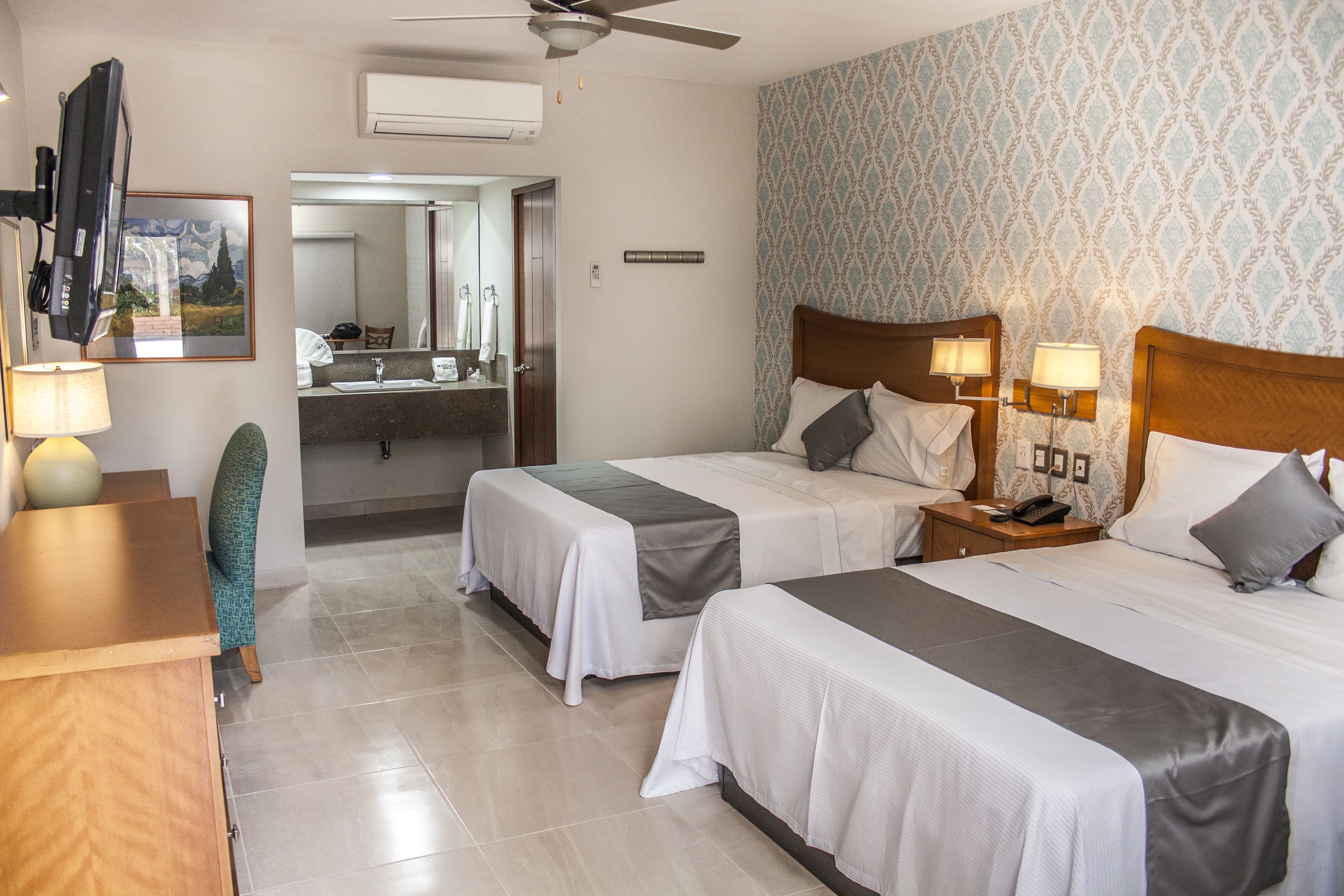 deluxe double room, 2 queen beds | hypo-allergenic bedding, pillow-top beds, desk, blackout curtains