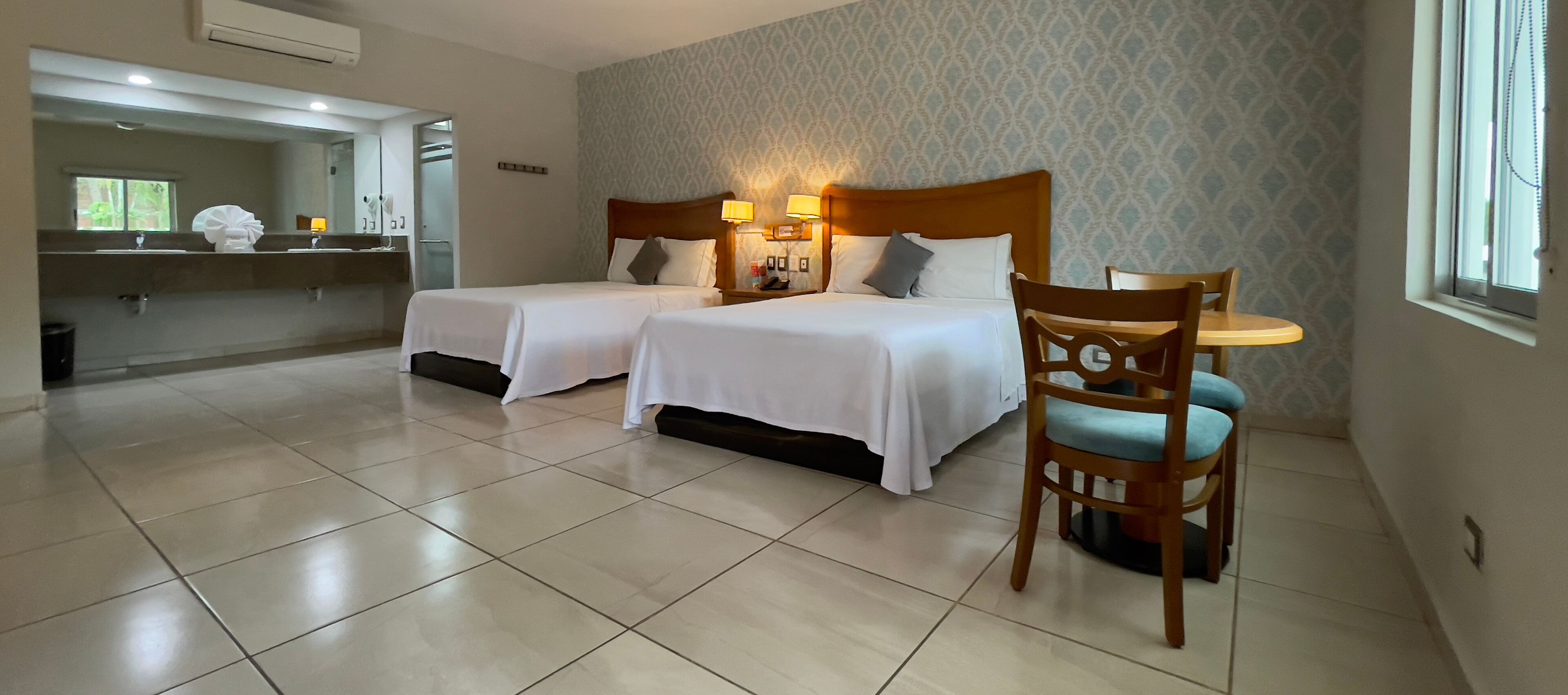 hypo-allergenic bedding, pillow-top beds, desk, blackout curtains