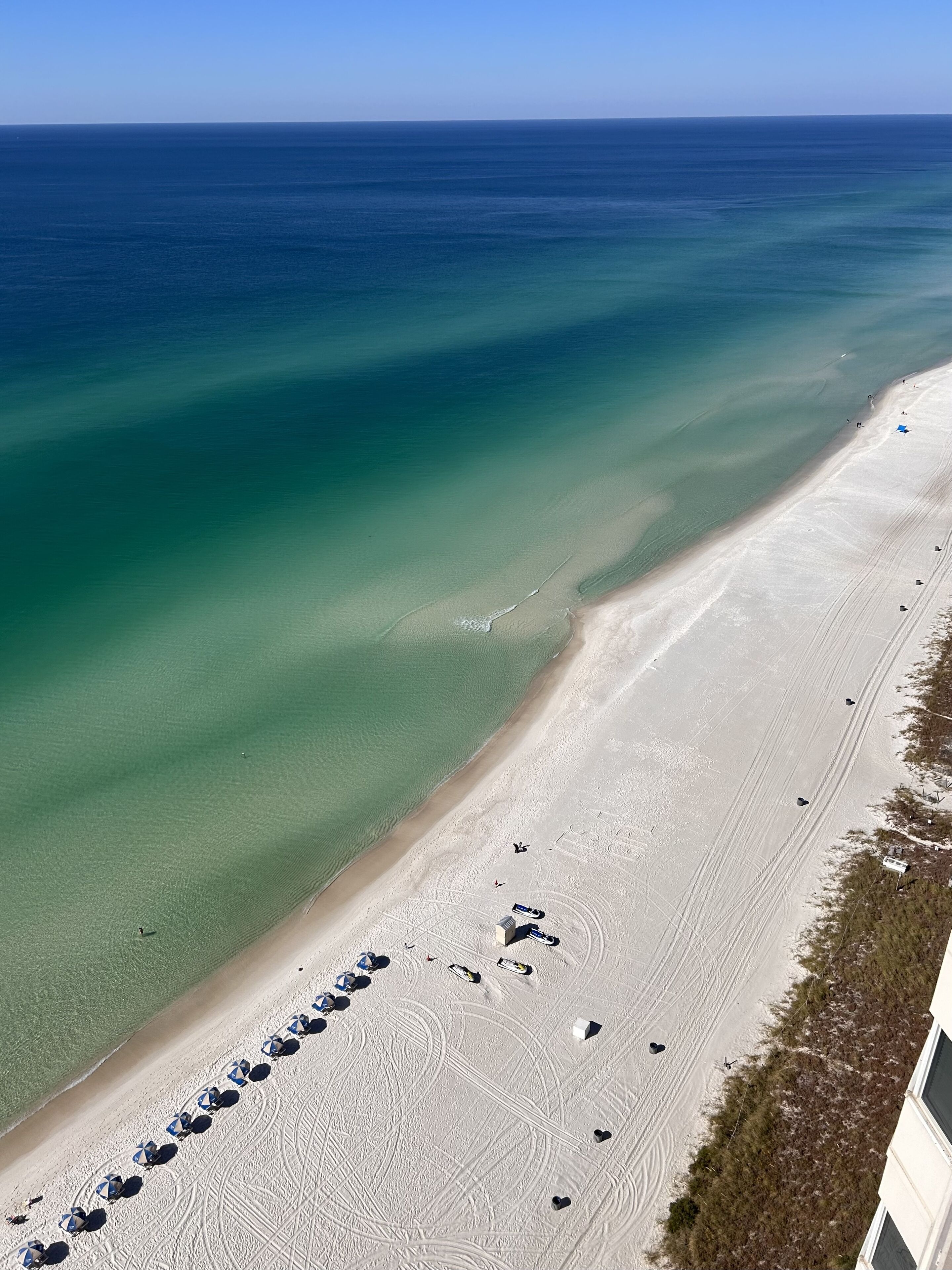 On the beach, sun loungers, beach towels