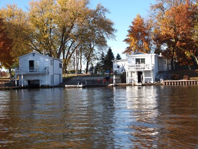 Year round Lake home w/wonderful frontage, nice yard w/ fire pit, home theatre