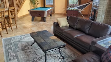 Smart TV, fireplace, DVD player, foosball