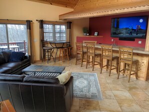 Smart TV, fireplace, DVD player, foosball