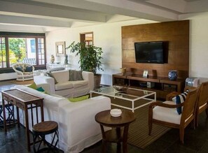 Comfort House, Non Smoking, Pool View | Living room | Flat-screen TV