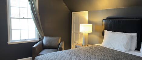 King Standard | Desk, laptop workspace, blackout drapes, iron/ironing board