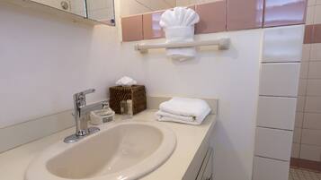 Shower, eco-friendly toiletries, hair dryer, towels