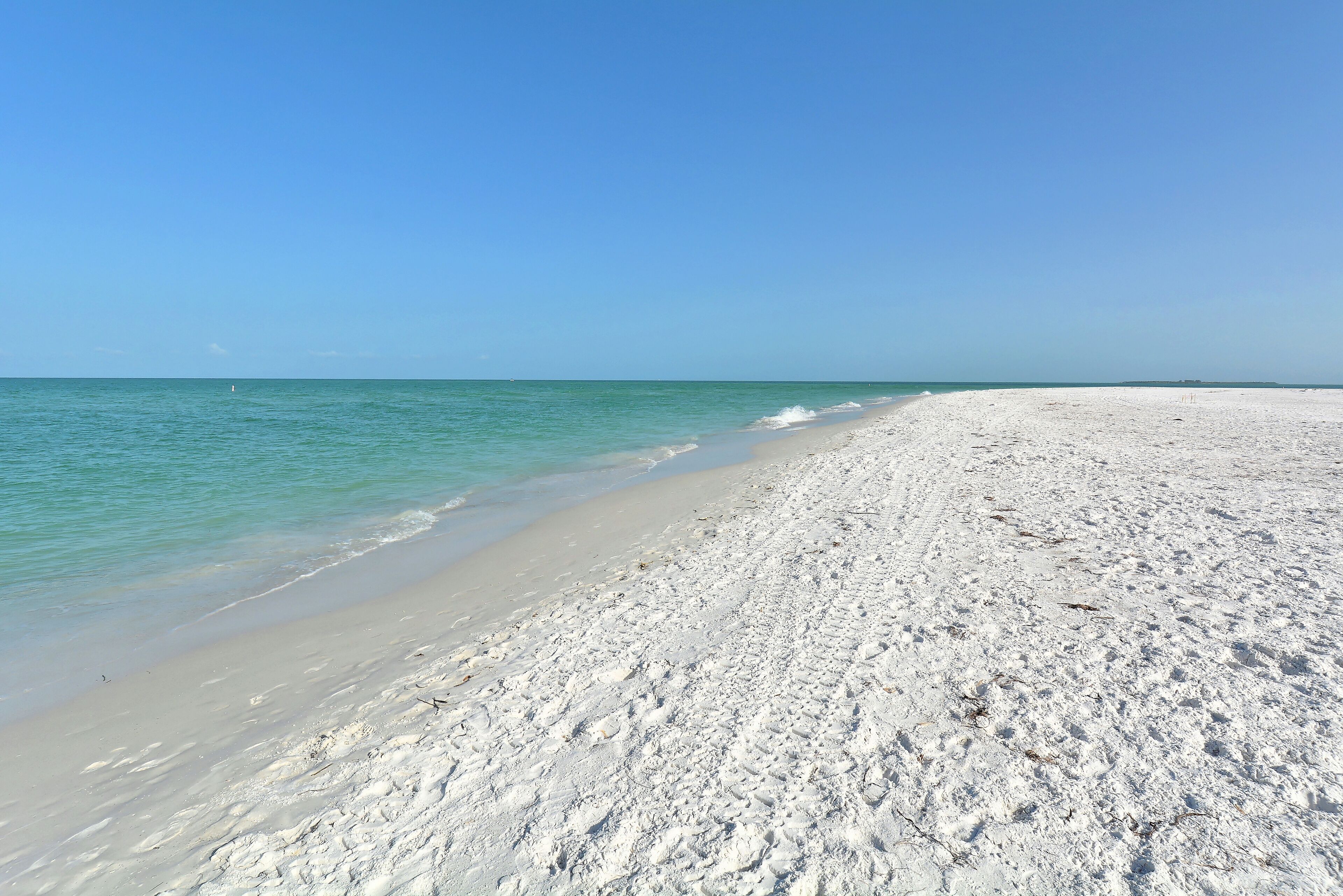 On the beach, sun loungers, beach towels