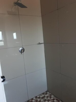 Shower, rainfall showerhead, towels