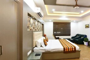 Habitación Deluxe, 1 habitación | Insonorización y ropa de cama 